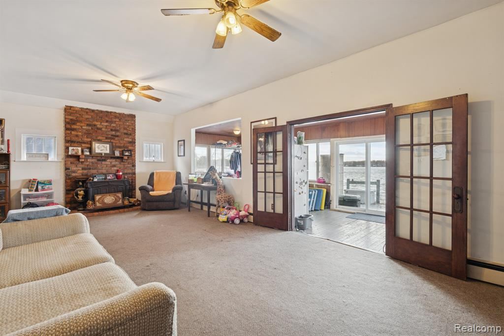 Living room with a wood stove and French doors