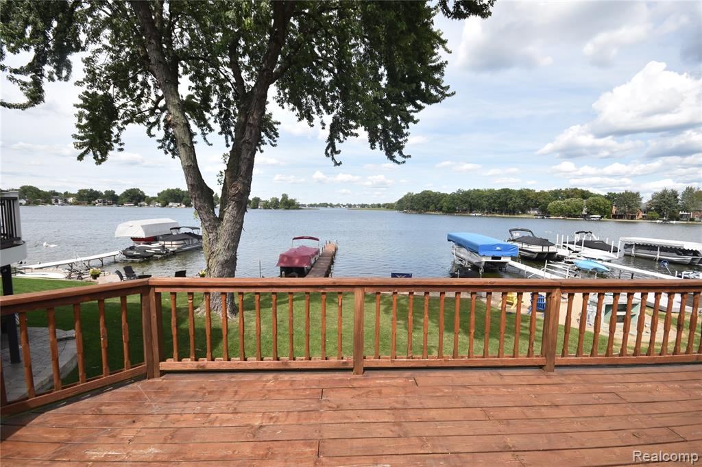 Deck view over the lawn, docks and lake